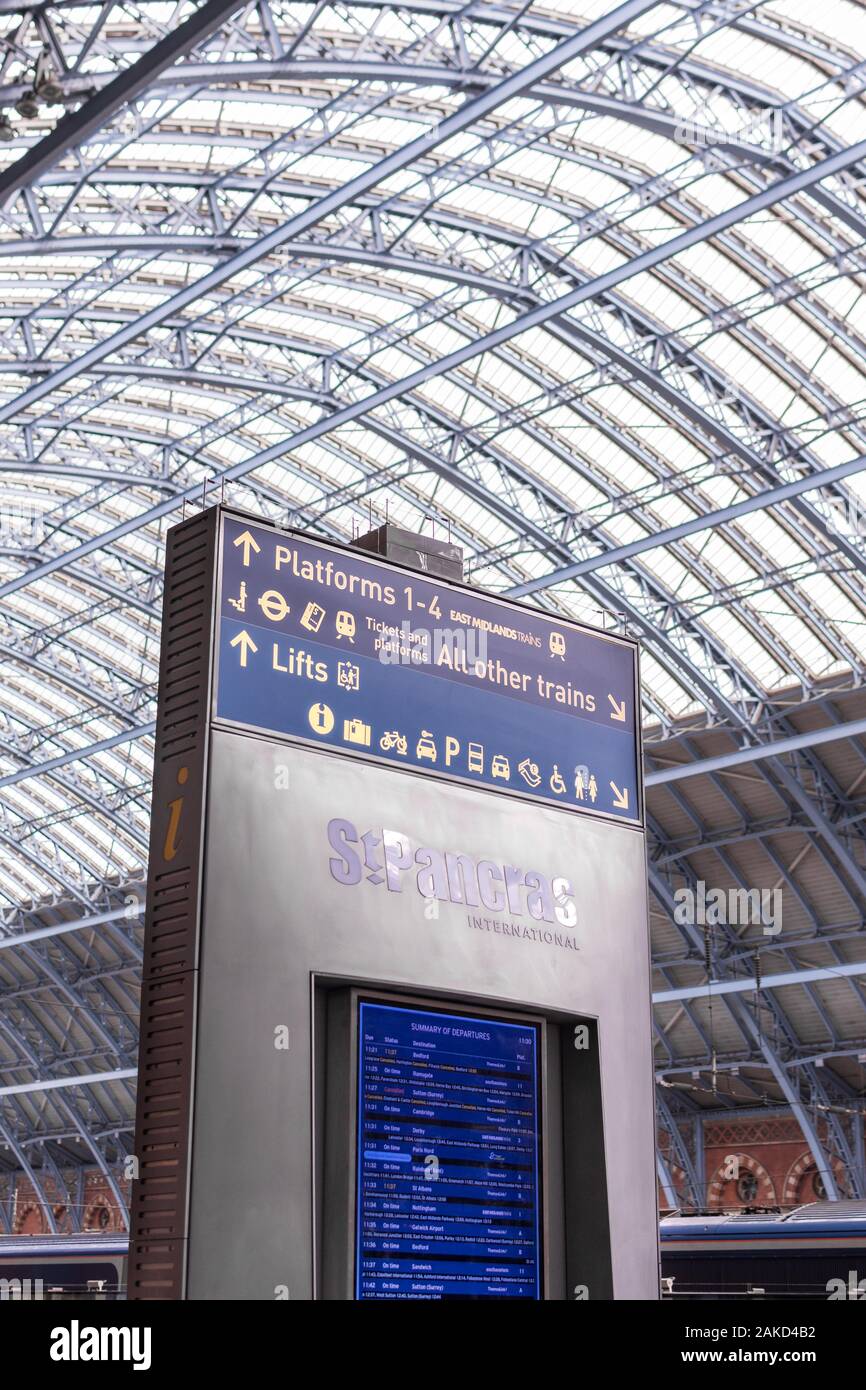 St Pancras International information sign with departure board, London, UK Stock Photo