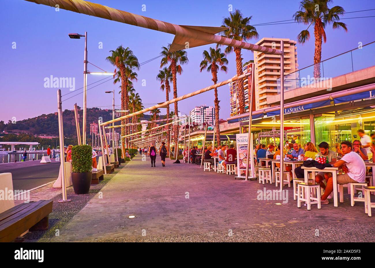 MALAGA, SPAIN SEPTEMBER 26, 2019 The line of crowded coastal cafes