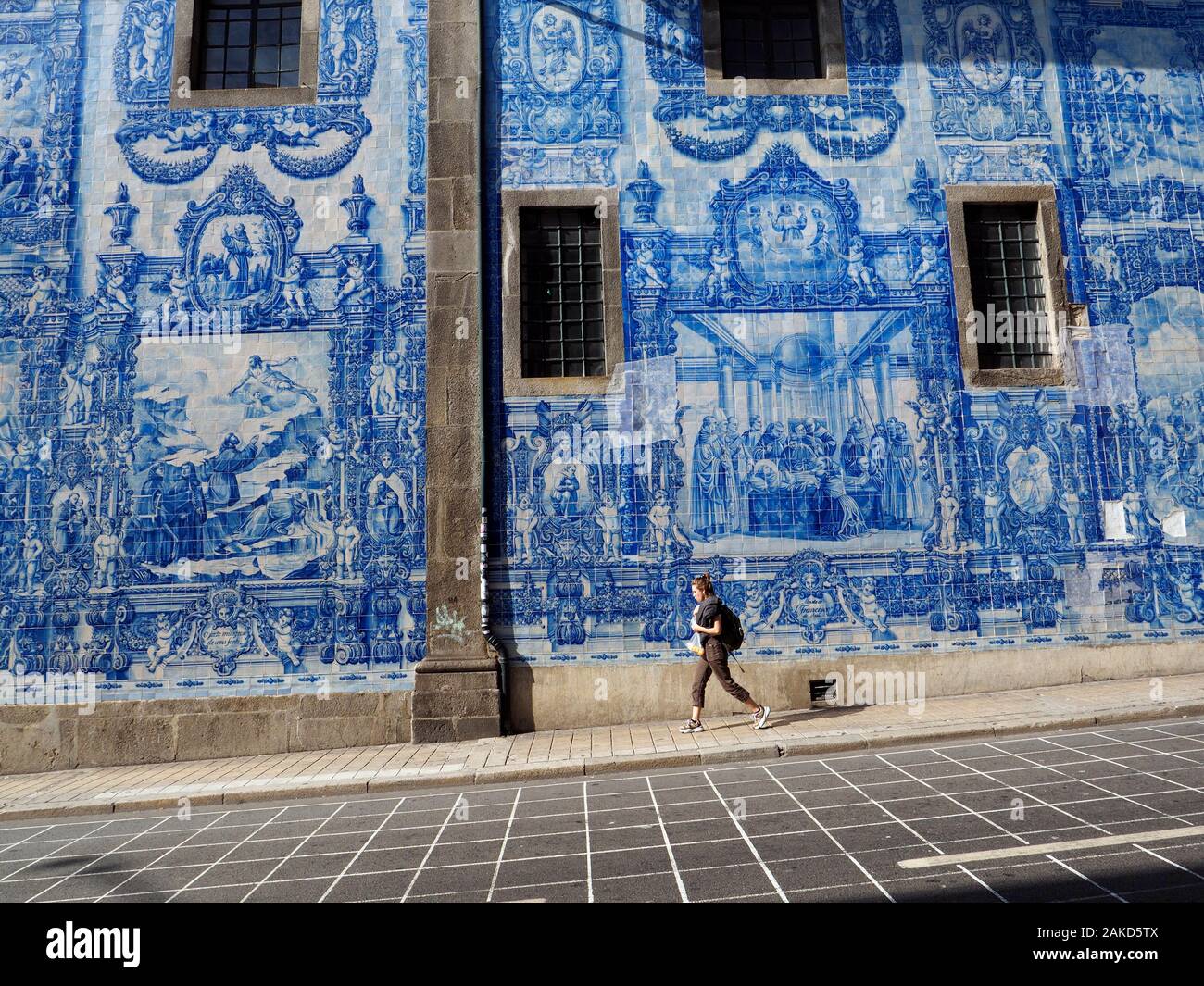 Side wall of a church decorated with traditional Portugese azulejos, blue  and white tiles. Porto, Portugal Stock Photo - Alamy