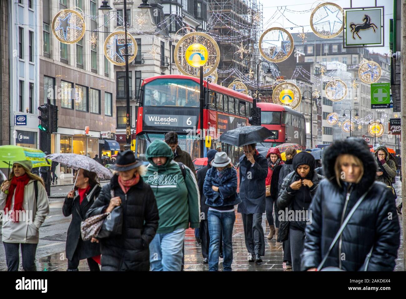 Road transport, double decker buses, rainy weather, London, United