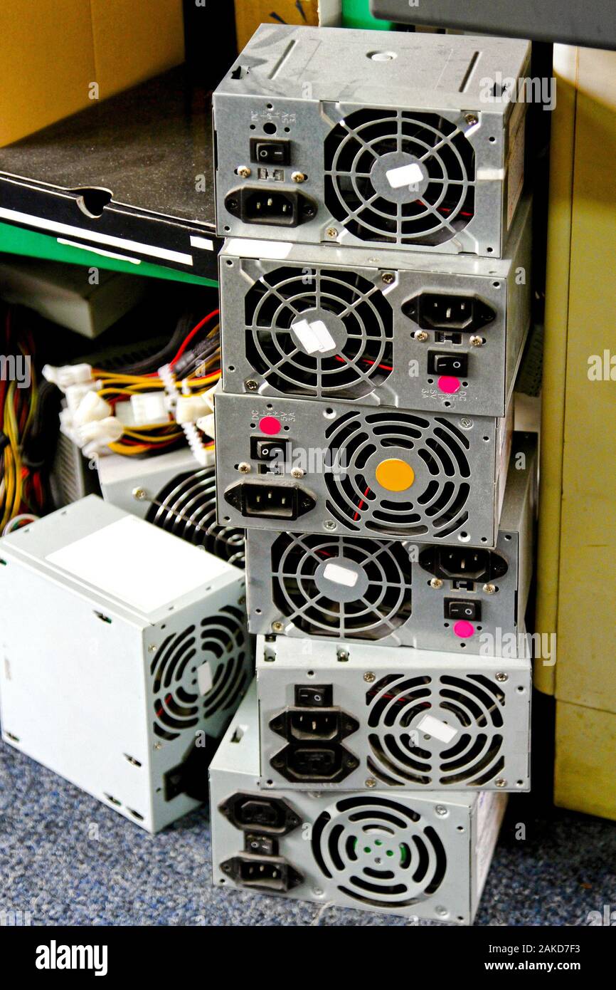 Tower of power supply units for personal computers Stock Photo Alamy