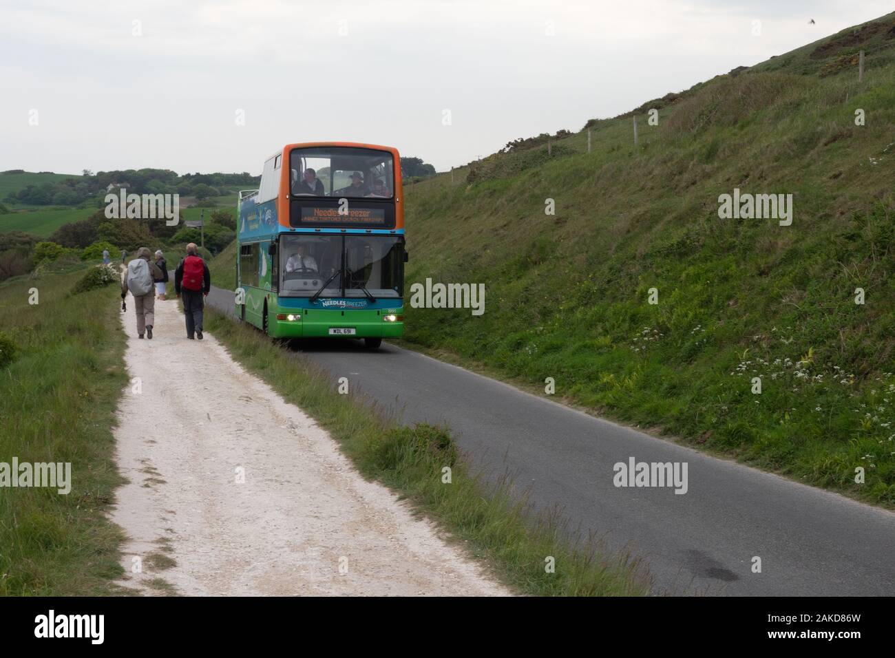 Needles Breezer WDL 691, a Plaxton President open top Volvo bus negotiating the hill to the Needles on the Isle of Wight Stock Photo