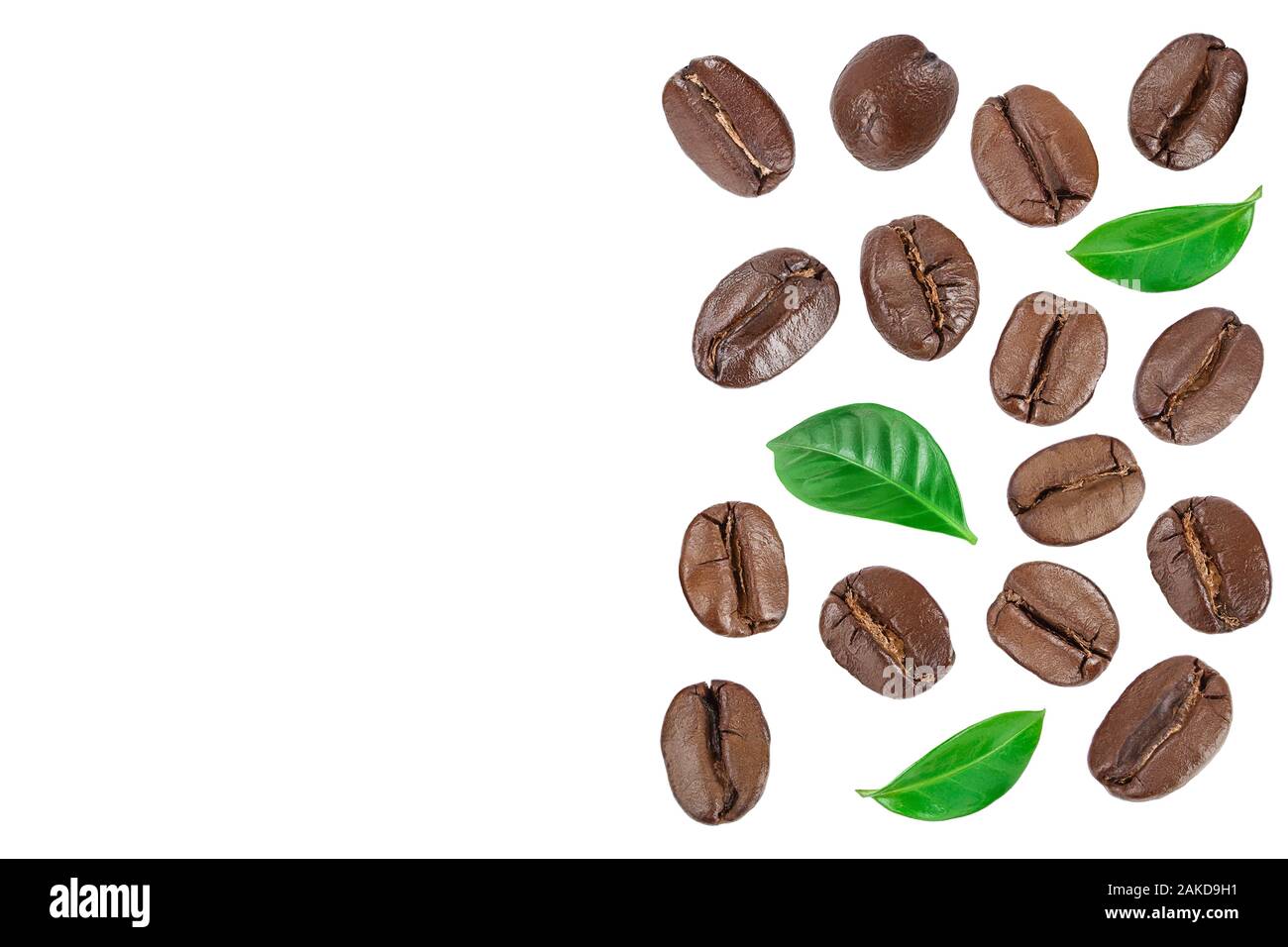 Heap of roasted coffee beans with leaves isolated on white background ...