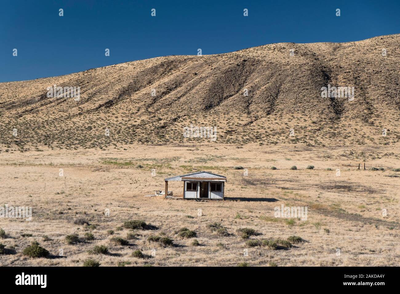 Abandoned house in the desert Stock Photo