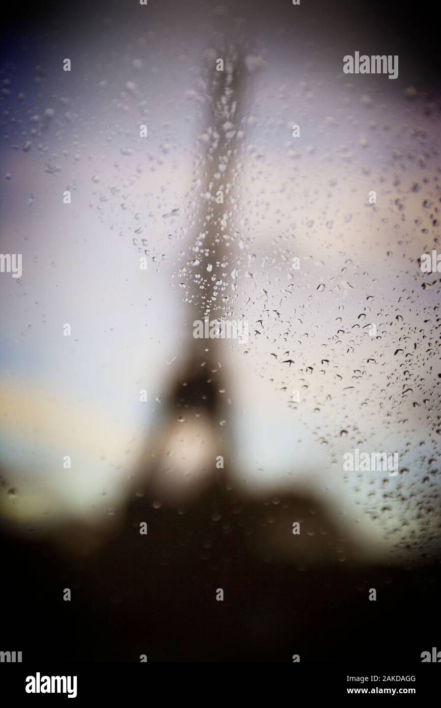 The Eifel Tower through a window in Paris, France. Stock Photo