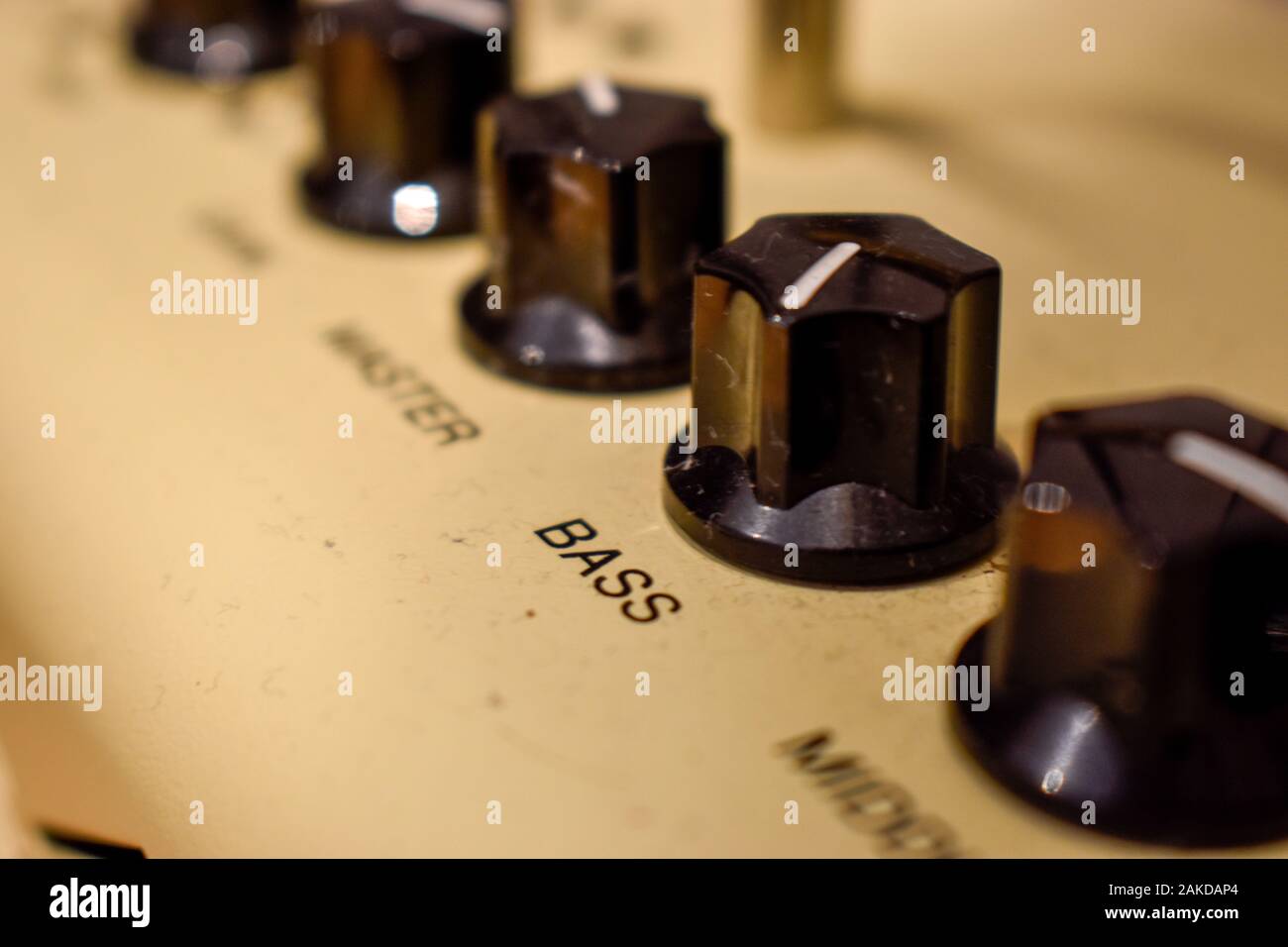 Close up of control knobs on an amp or amplifier for electric and bass guitars Stock Photo Alamy