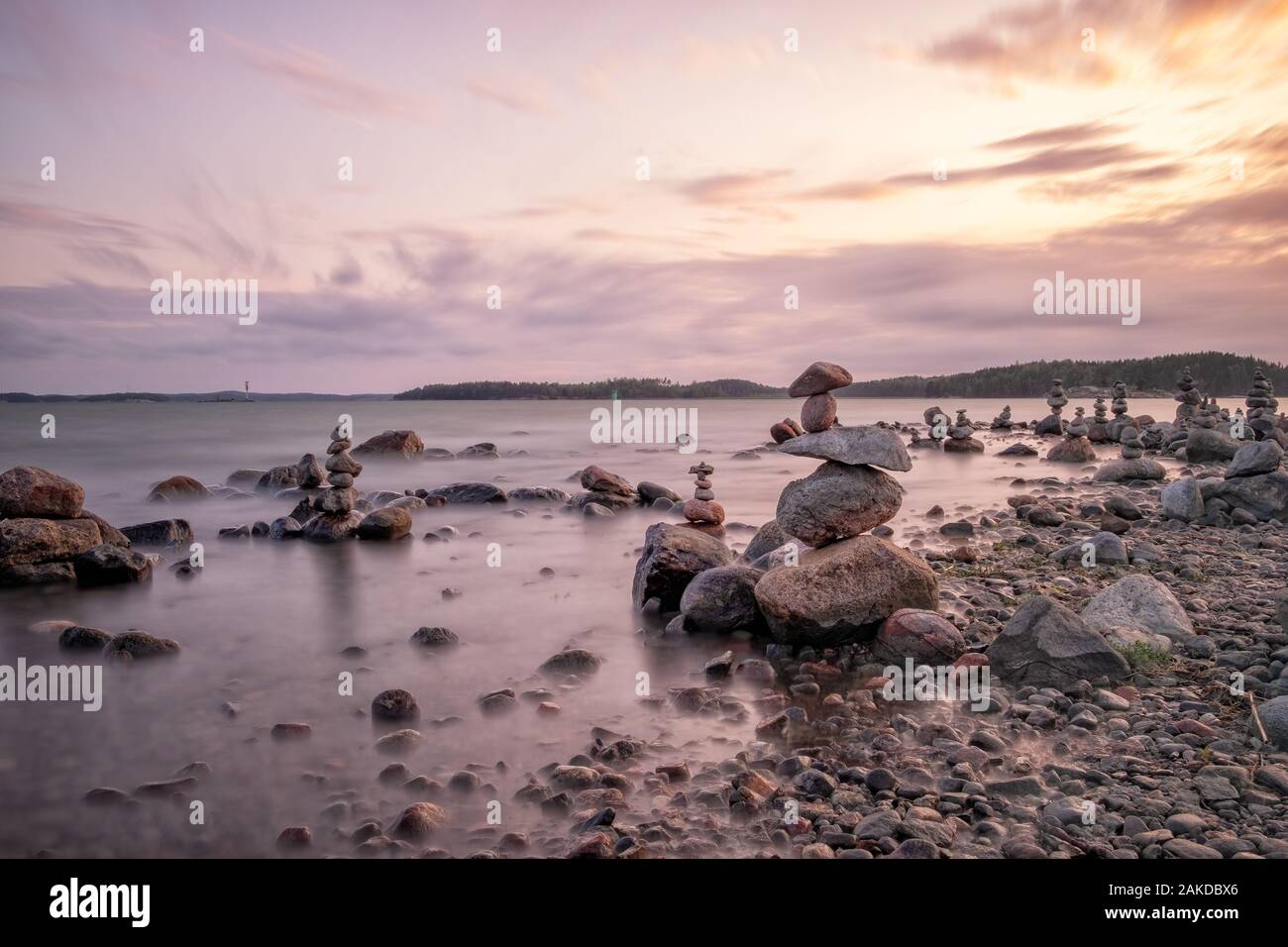 Zen concept, the object of the stones on the beach at sunset, harmony and meditation. Stock Photo