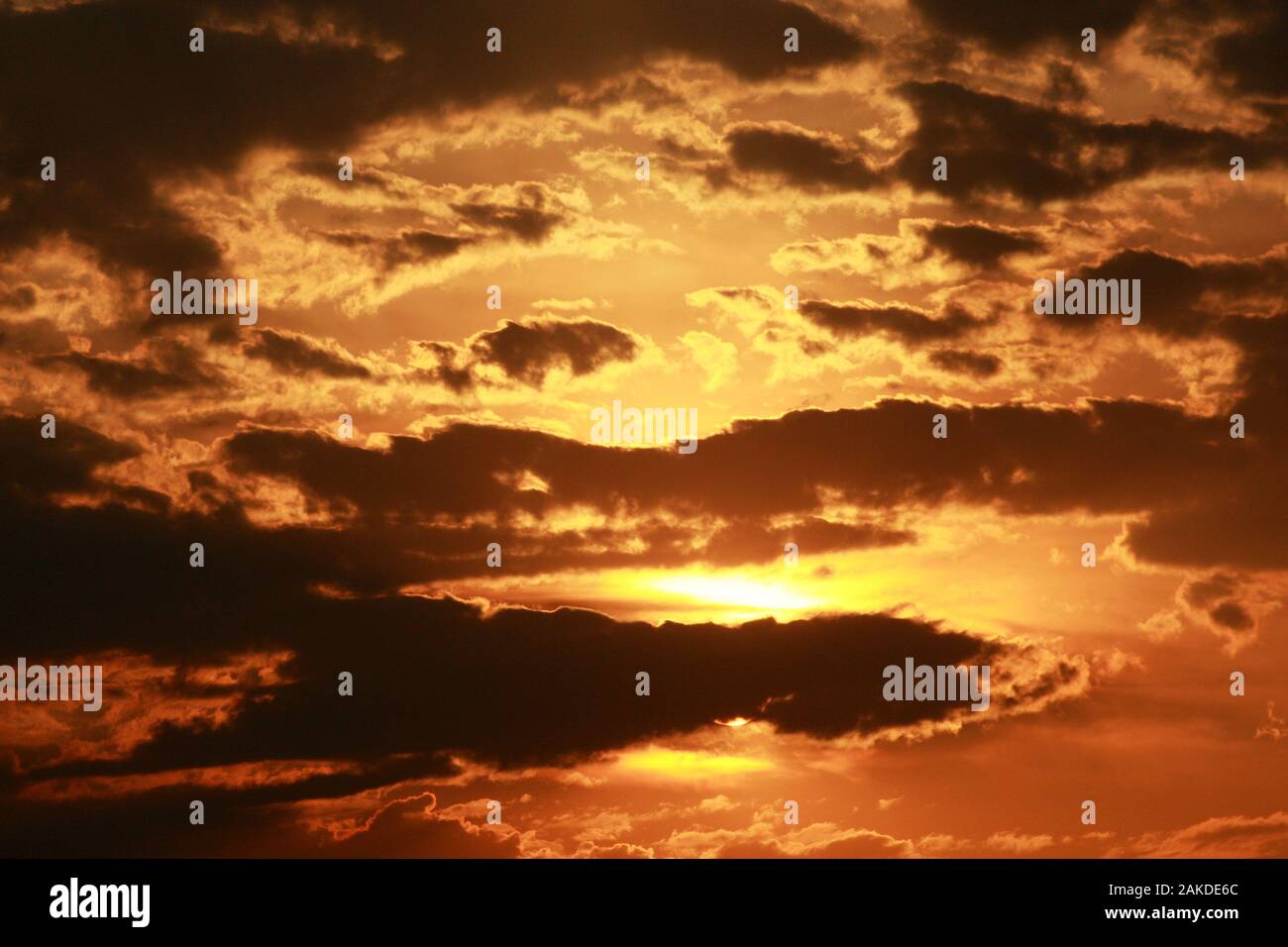 Beautiful sunset sky with bright clouds Stock Photo - Alamy