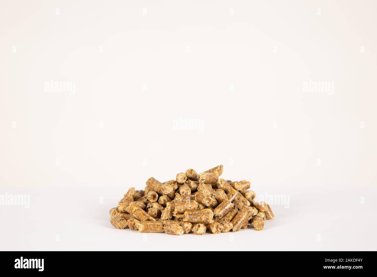 Pile of compressed wood pellets. Ecological renewable biofuel Stock