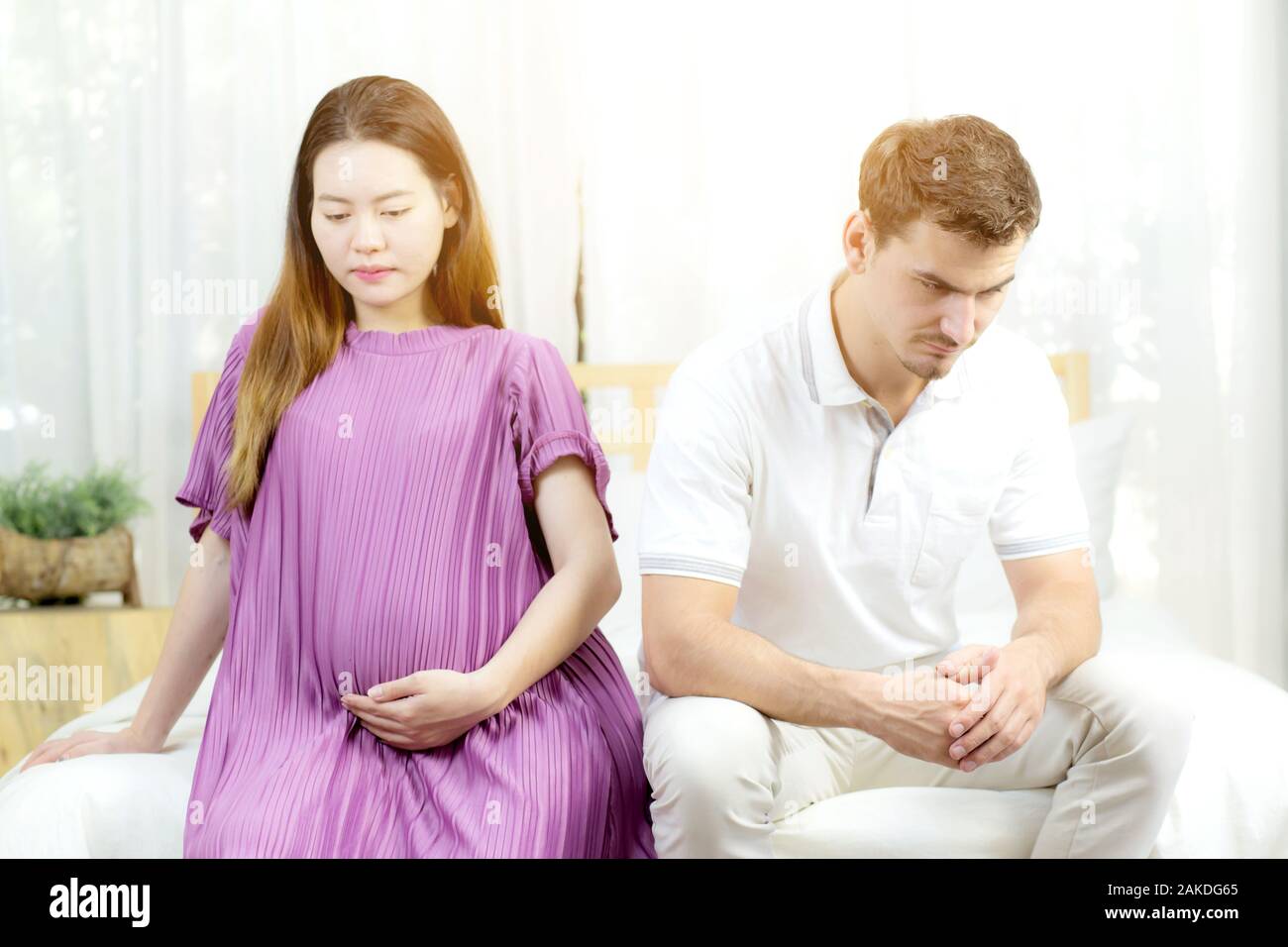 Beautiful asian young woman pregnant and husband with problem relationship, unhappy and stress, family with abortion concept Stock Photo picture