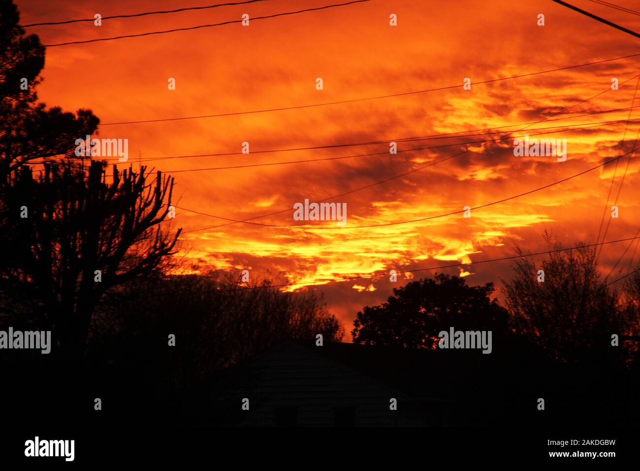 Spectacular sunset sky over the city Stock Photo - Alamy