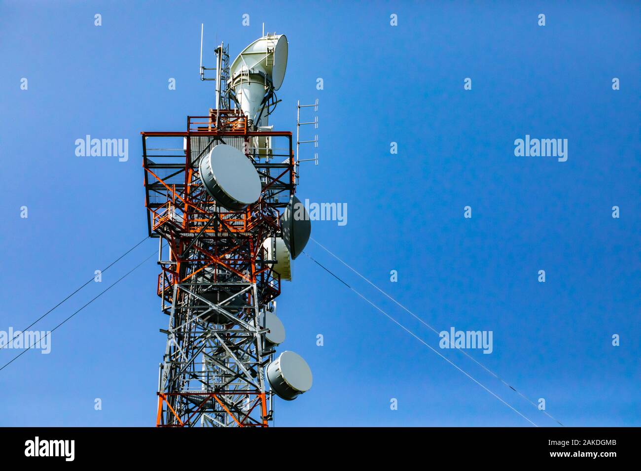 A low angle detailed view of a cable stayed steel lattice pylon housing
