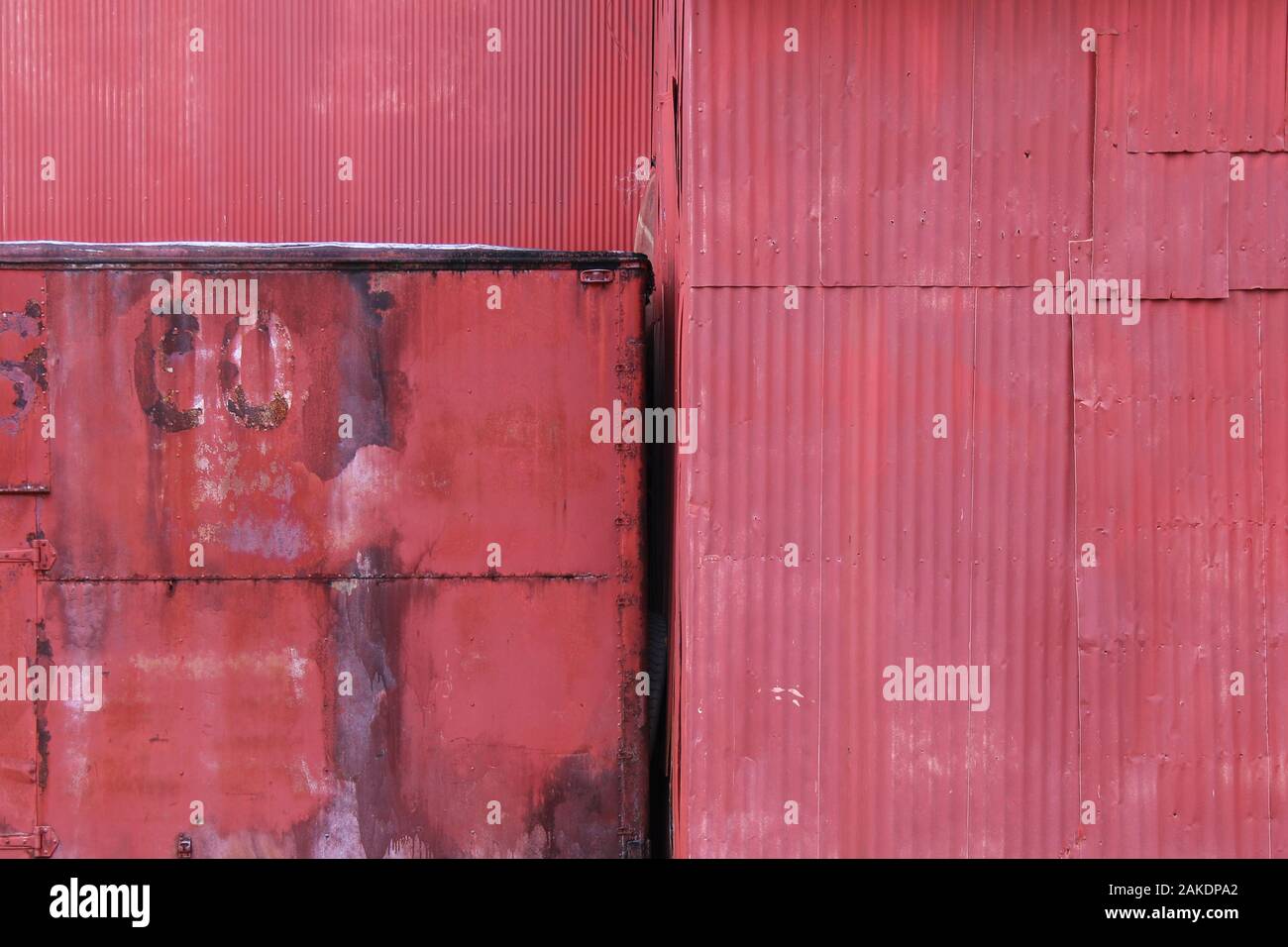rusty wall red abandoned building building farm yard Stock Photo - Alamy