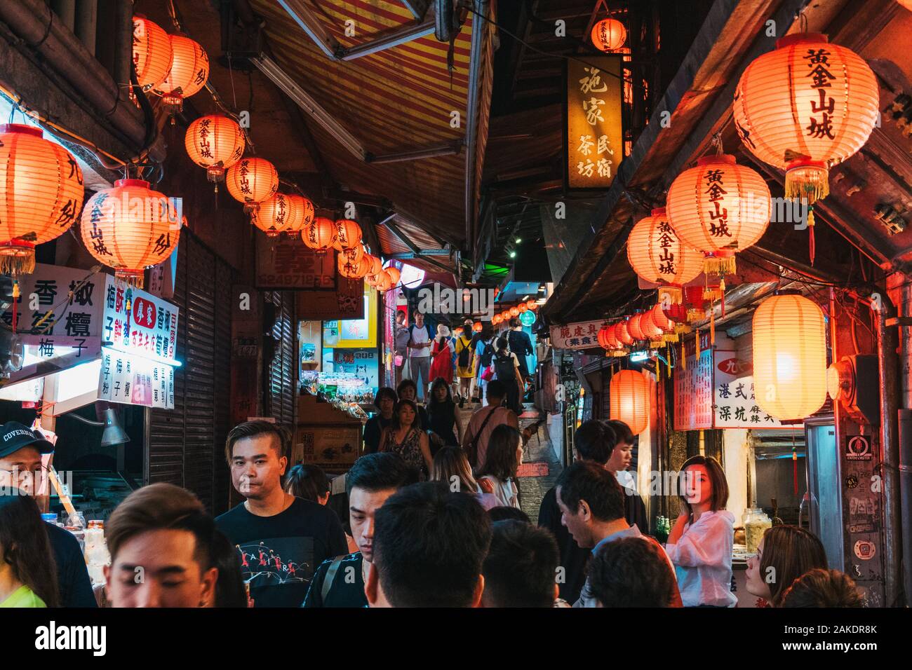 Lanterns hang along the narrow market streets of Jiufen Old Street, a popular tourist destination near Taipei, Taiwan Stock Photo
