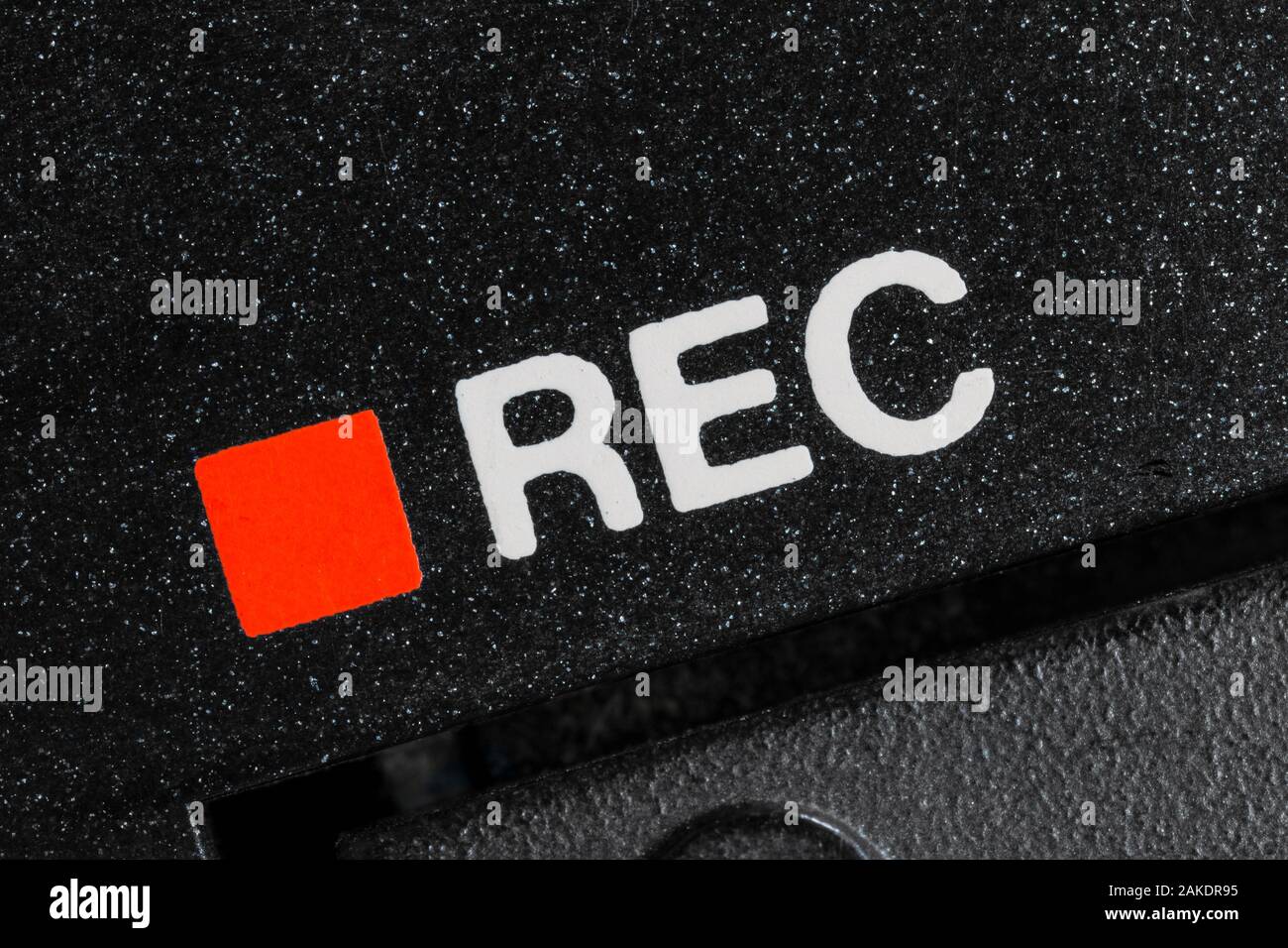 Close up macro photograph of vintage tape machine record button function detail. Stock Photo