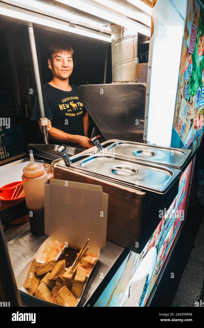 A street food vendor cooking stinky tofu in Hengchun Township, Taiwan Stock Photo