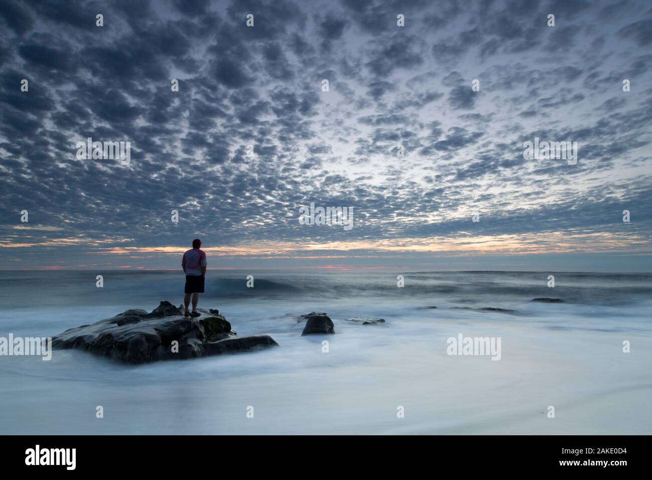 Man watching sunset hi-res stock photography and images - Alamy