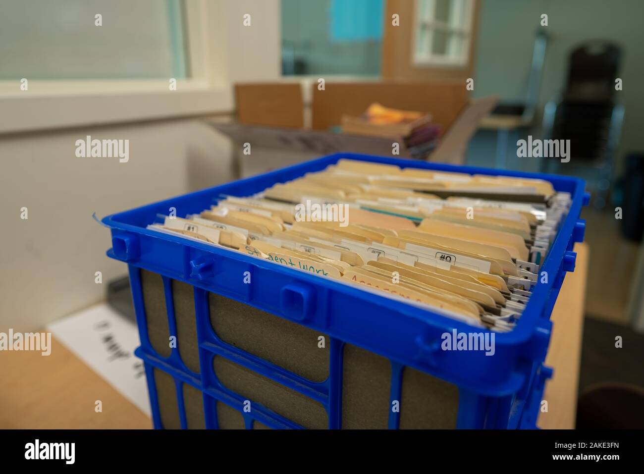 Storage crate with manila folders inside with bits of paperwork Stock ...