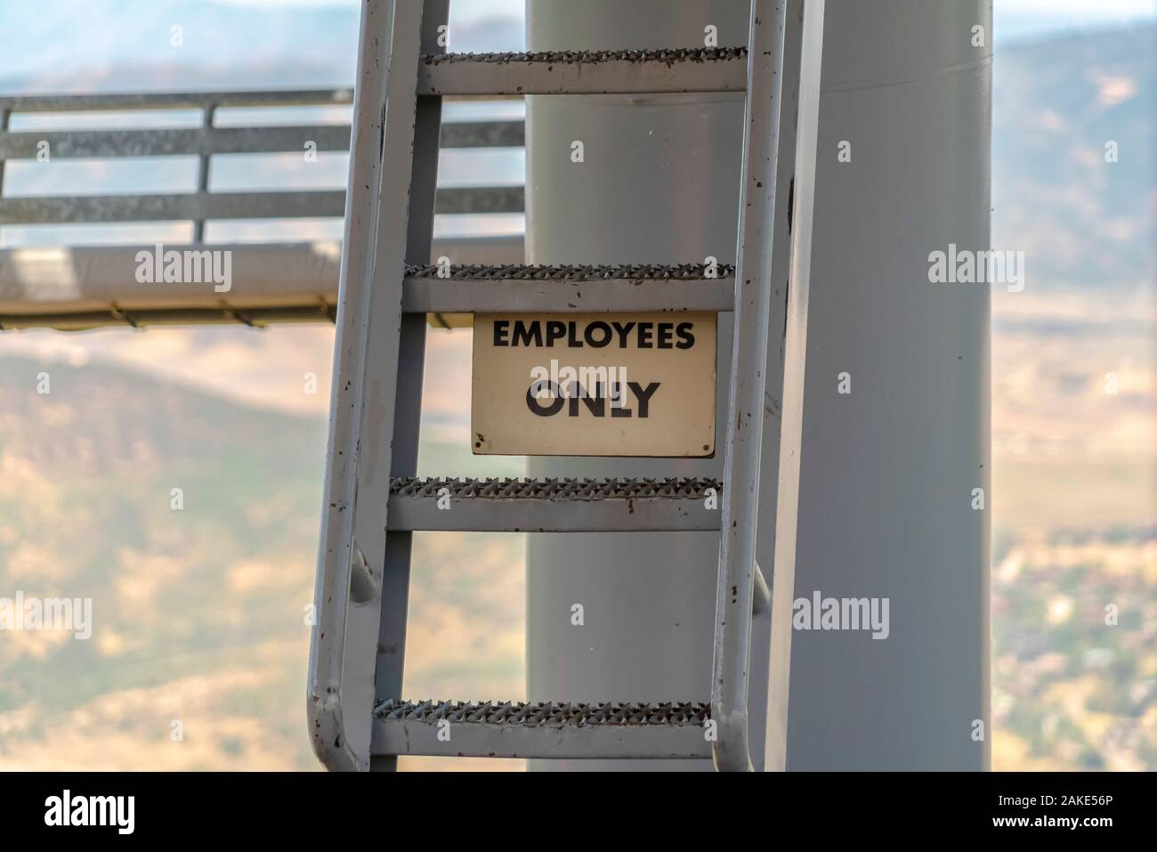 Park City Utah in summer with Employees Only sign and ladder under chairlifts Stock Photo