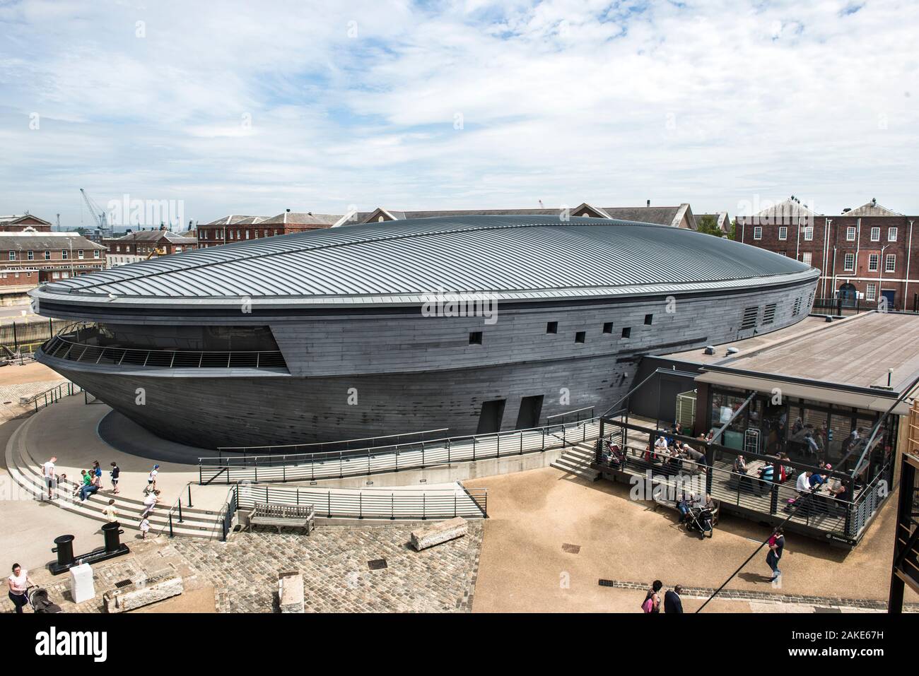 Mary Rose Museum, H M Naval Base, Portsmouth, Hants, England. External elevated view of museum housing Henry VIII's favorite ship and the cafe patio. Stock Photo