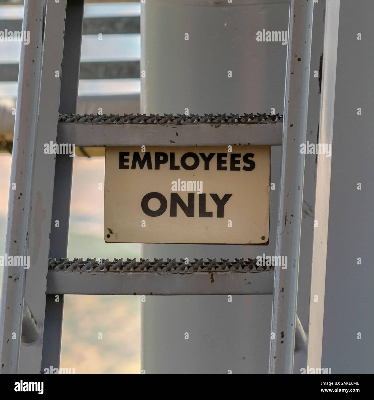 Square frame Park City Utah in summer with Employees Only sign and ladder under chairlifts Stock Photo