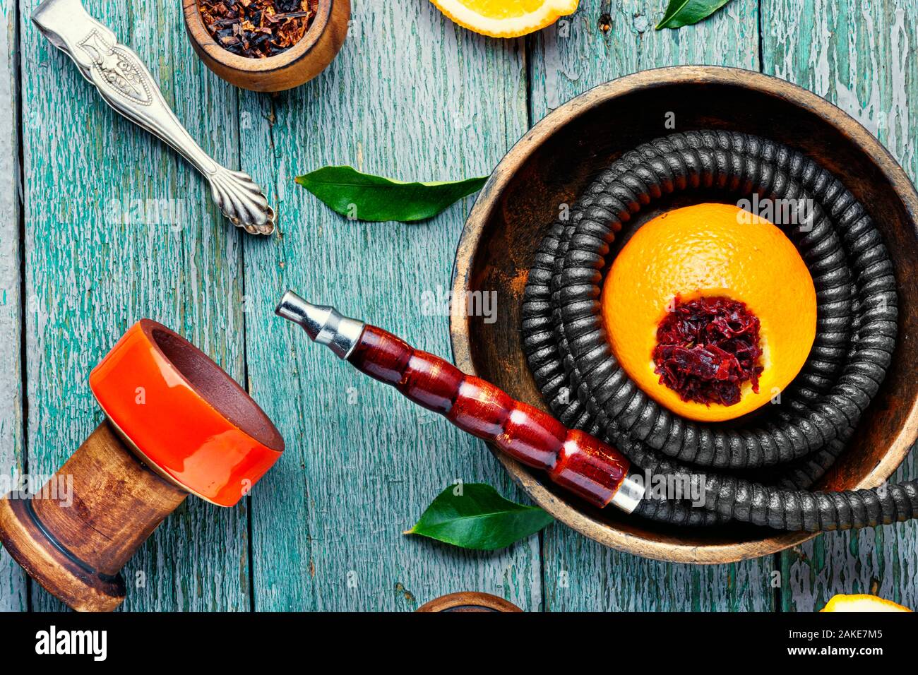 Details of tobacco hookah and tobacco with orange aroma.Fruit shisha