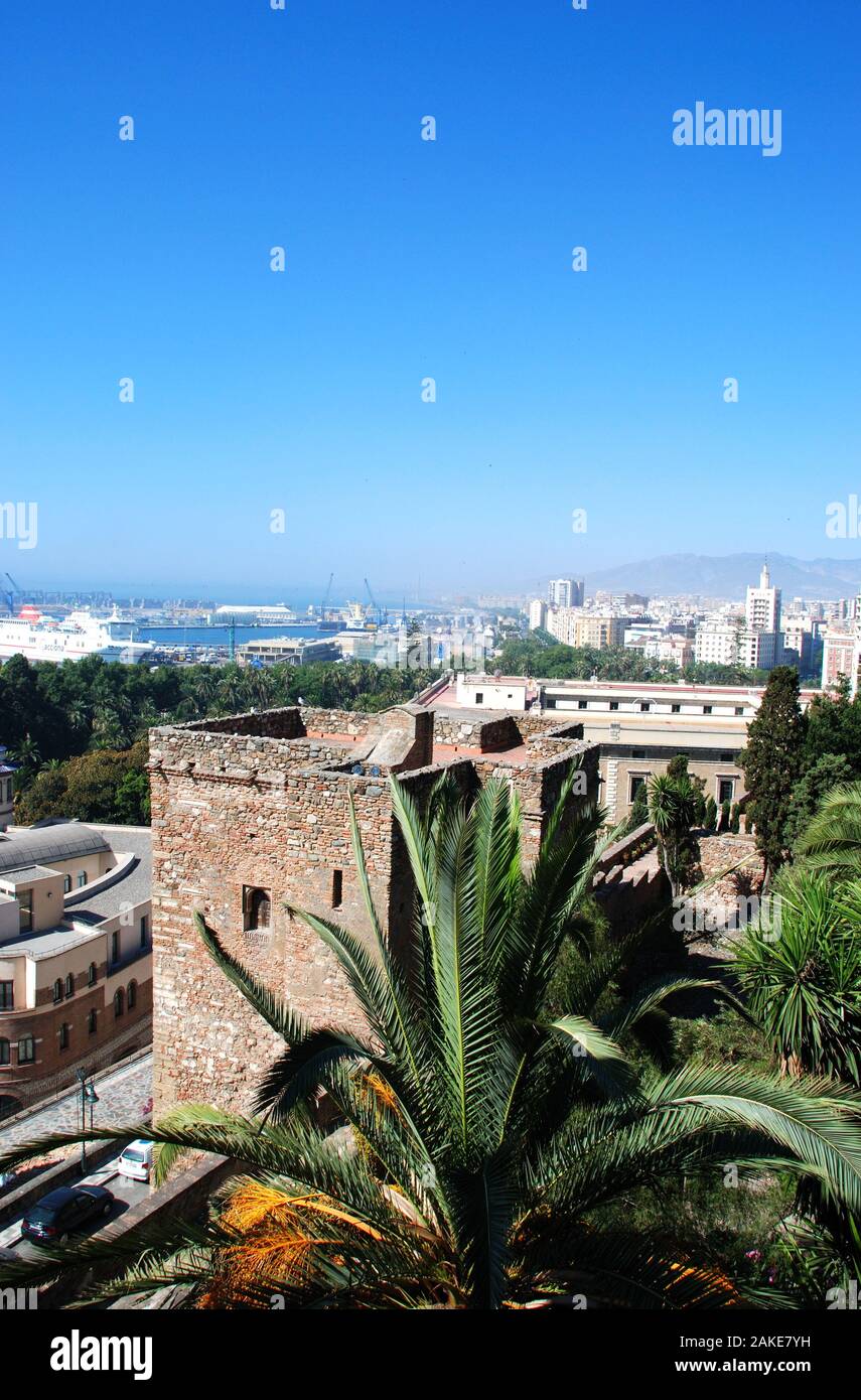 Elevated harbour view with the Christs Gate of Malaga castle in the foreground, Malaga, Malaga Province, Andalucia, Spain. Stock Photo
