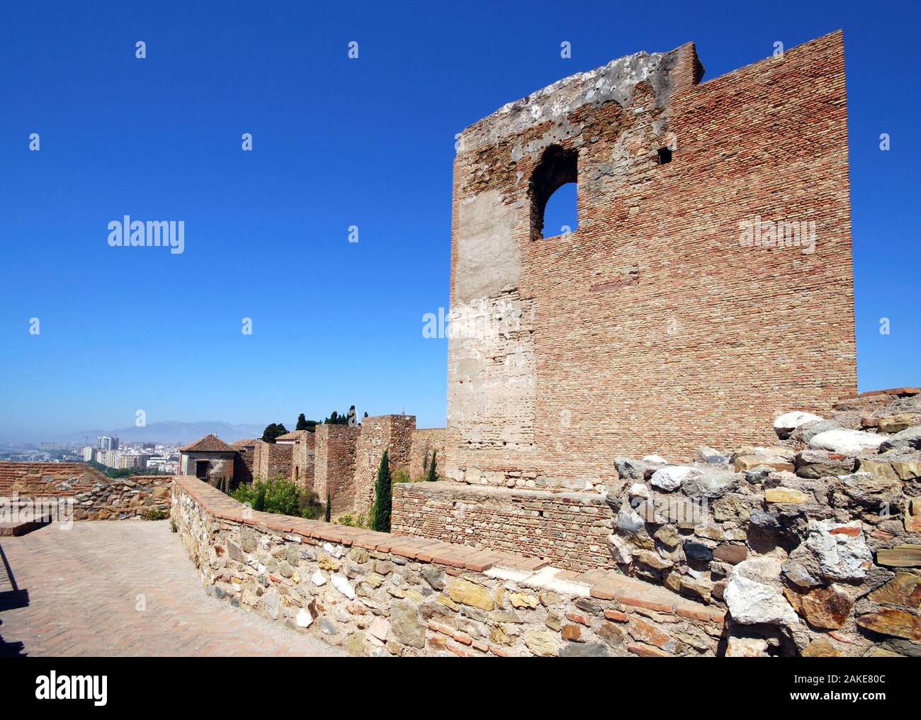 Upper walled precinct and tower of the citadel at Malaga castle, Malaga, Malaga Province, Andalucia, Spain, Europe. Stock Photo