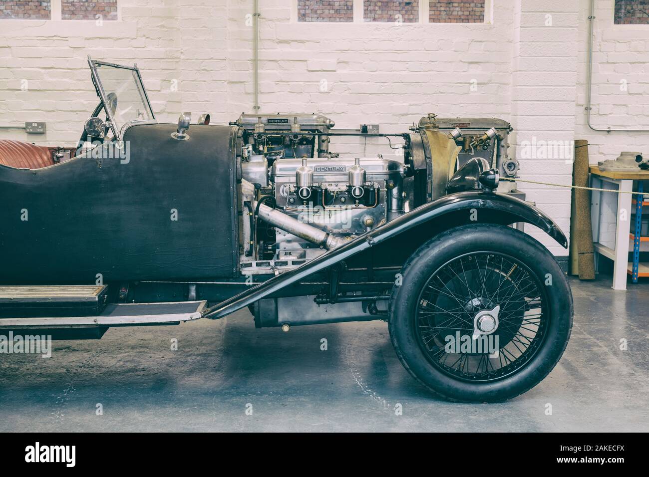 1924 Bentley 3 Liter Speed Model in a workshop at Bicester Heritage Centre Sunday scramble event. Oxfordshire, England. Vintage filter applied Stock Photo