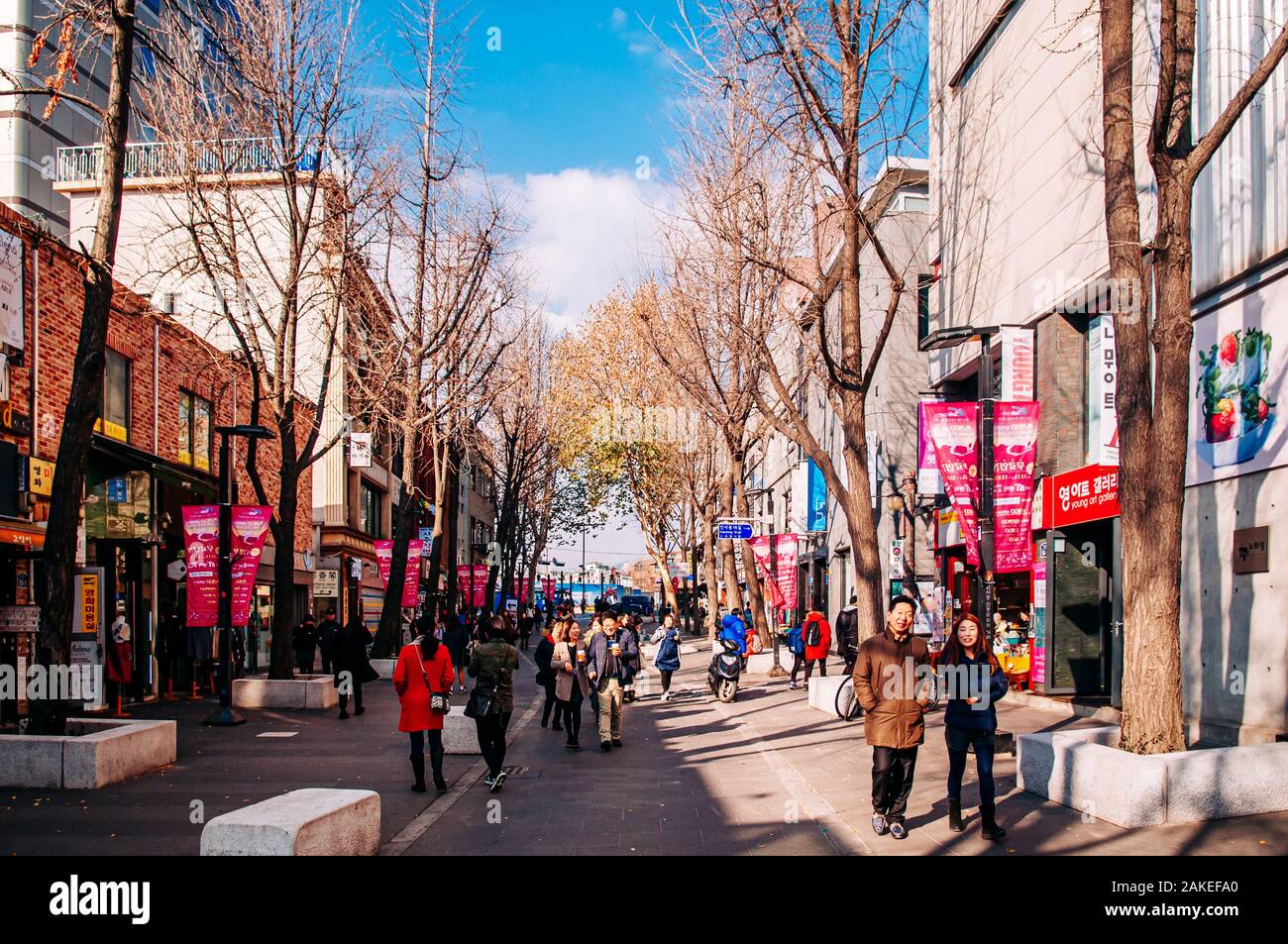 DEC 11, 2015 Seoul, South Korea - Many Asian Tourists walking on shopping street of Insadong district, Art and craft area of Seoul - South Korea Stock Photo