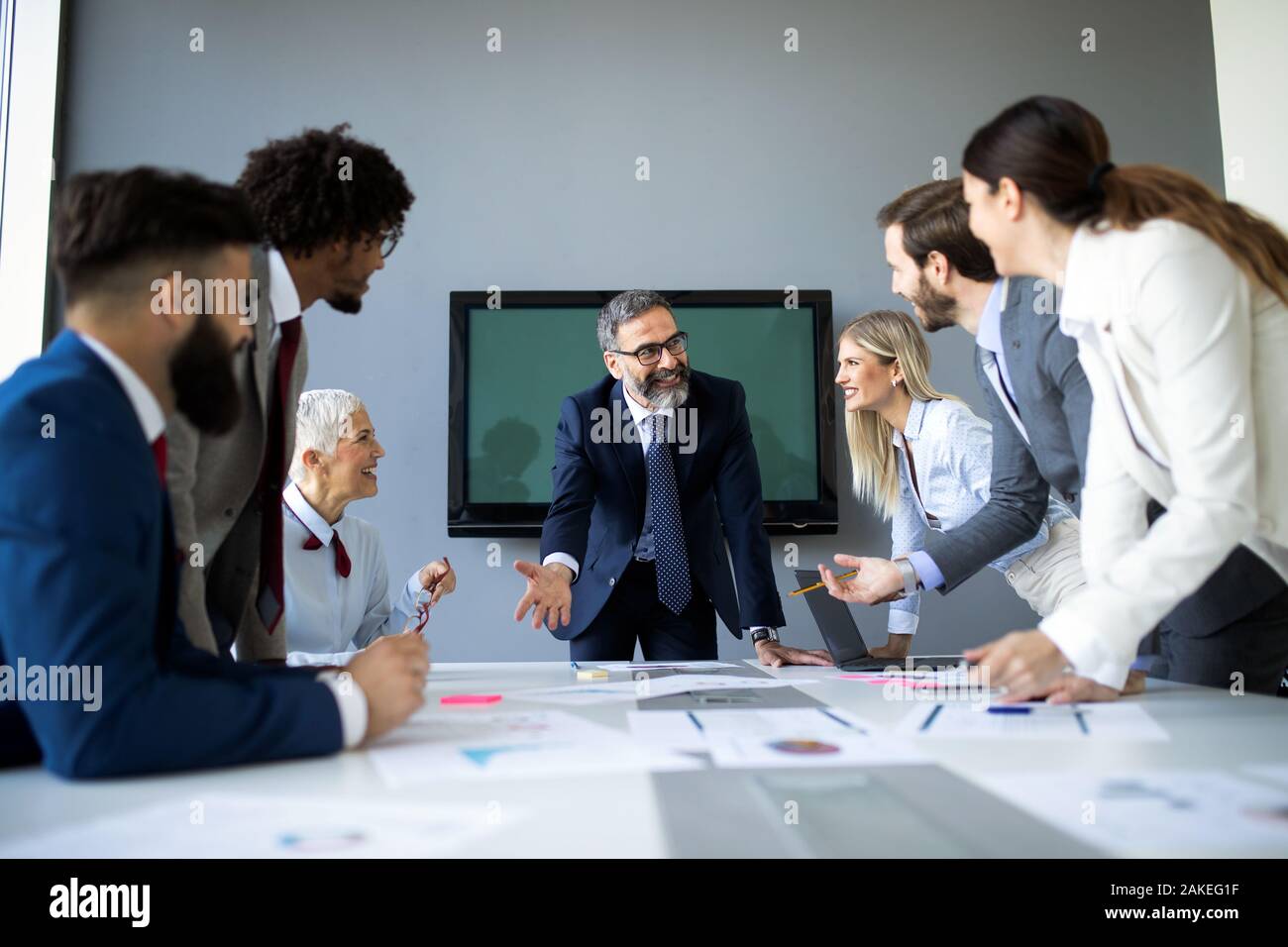 Group of business people discussing, brainstorming in office ...