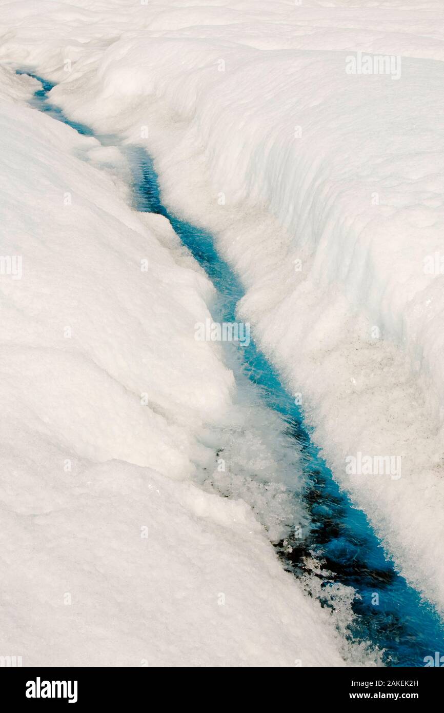 Melt water on the Greenland ice sheet near camp Victor north of Ilulissat, Greenland, July 2008. Stock Photo