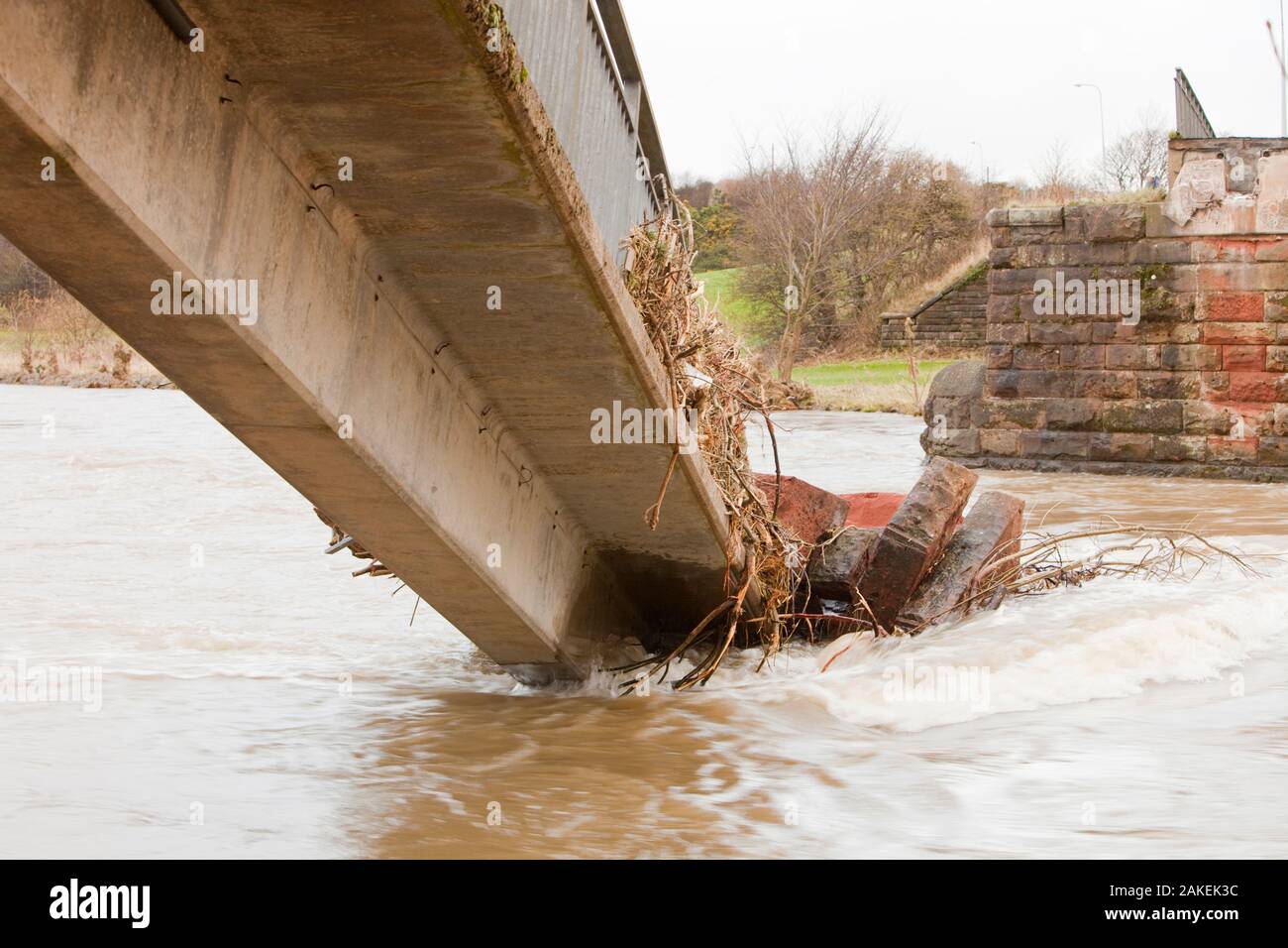 Footbridge over the River Derwent, collapsed during flooding, Workington, England, UK, November 2009. Stock Photo