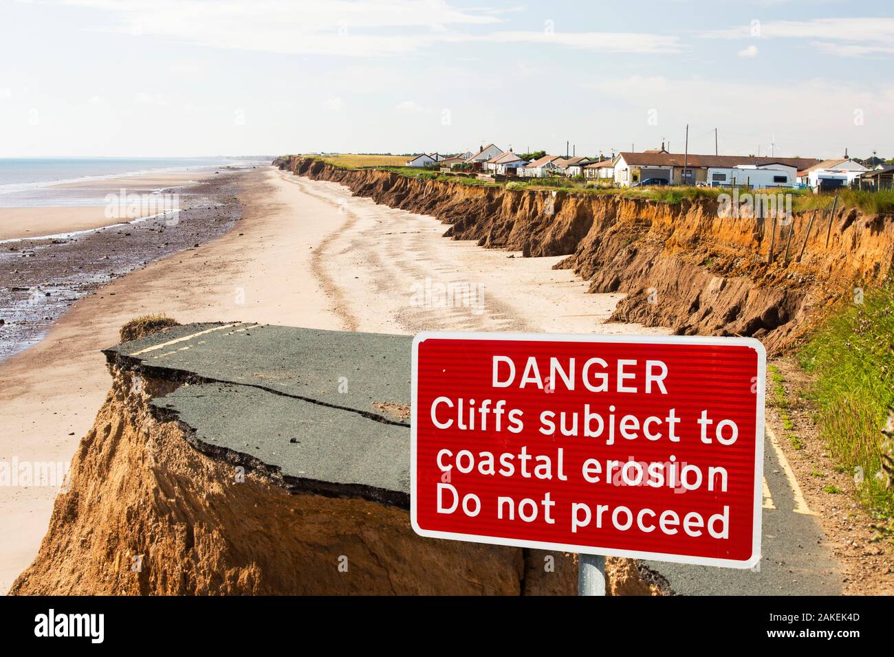 Collapsed coastal road near Skipsea, Yorkshire, England, UK. August 2013. Stock Photo