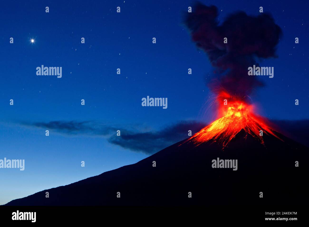 Tungurahua Volcano erupting at dawn, Ecuadorian Eastern Slopes, Tungurahua, Ecuador, February 2014. Stock Photo