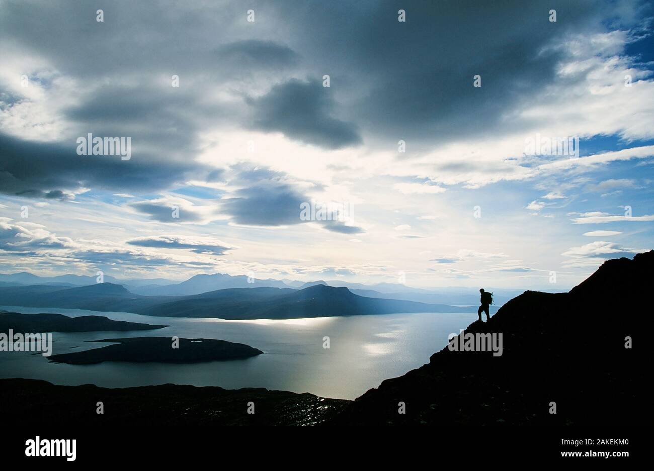 Walker on Ben Mor Coigach in the north West Highlands of Scotland, UK. Stock Photo