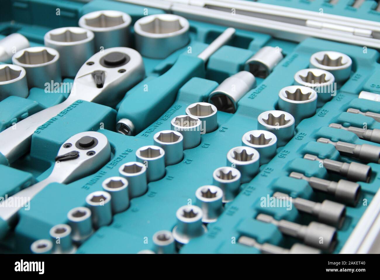 a fully stocked ratchet box with various bits and nuts Stock Photo - Alamy