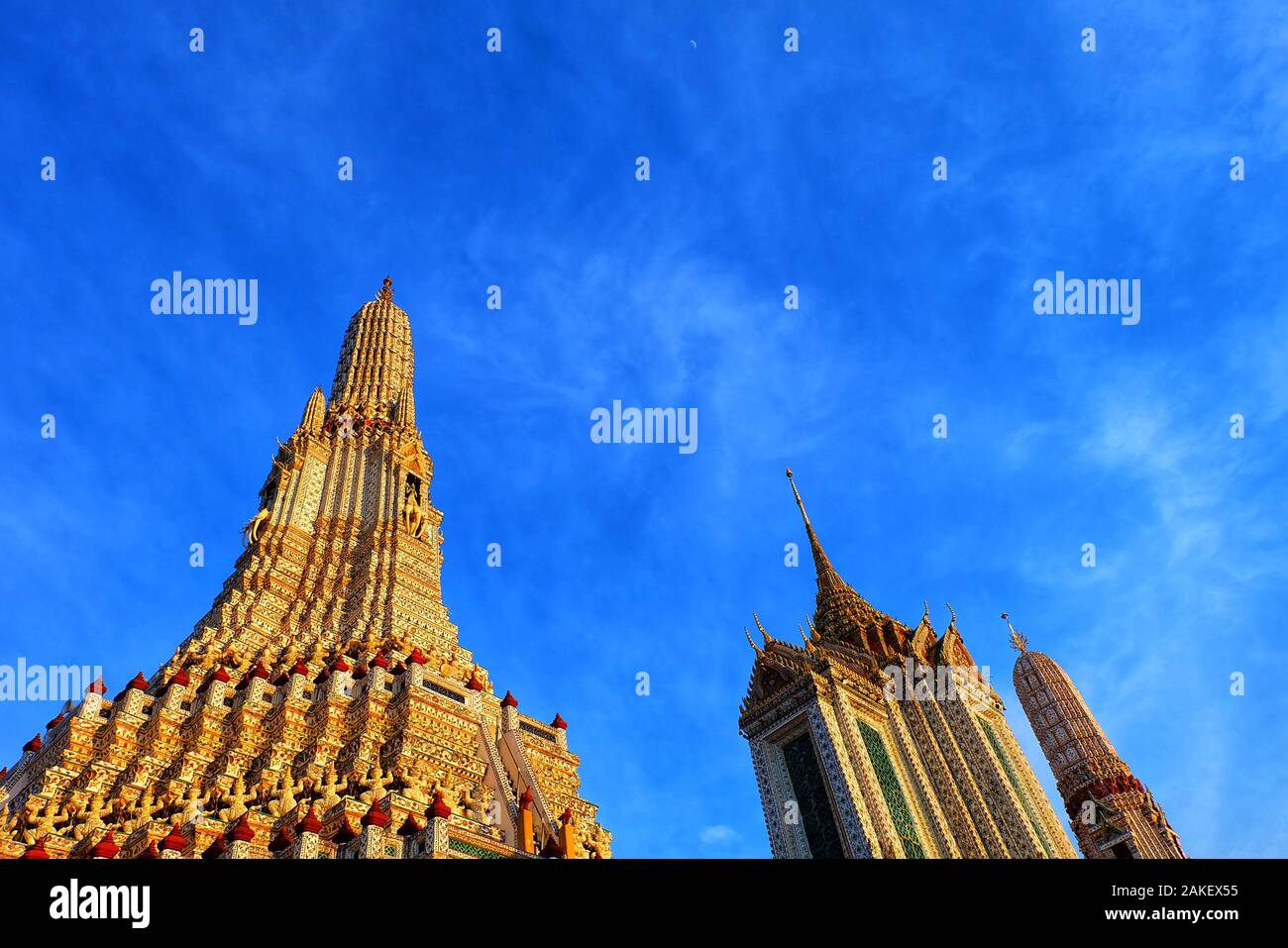 Beautiful super clear sky and clouds over pagoda, parts of artistic temple in Asia. Fine holy architecture of Buddhism. The religious spiritual center Stock Photo