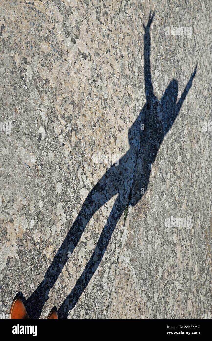 Woman silhouette arms up hi-res stock photography and images - Alamy