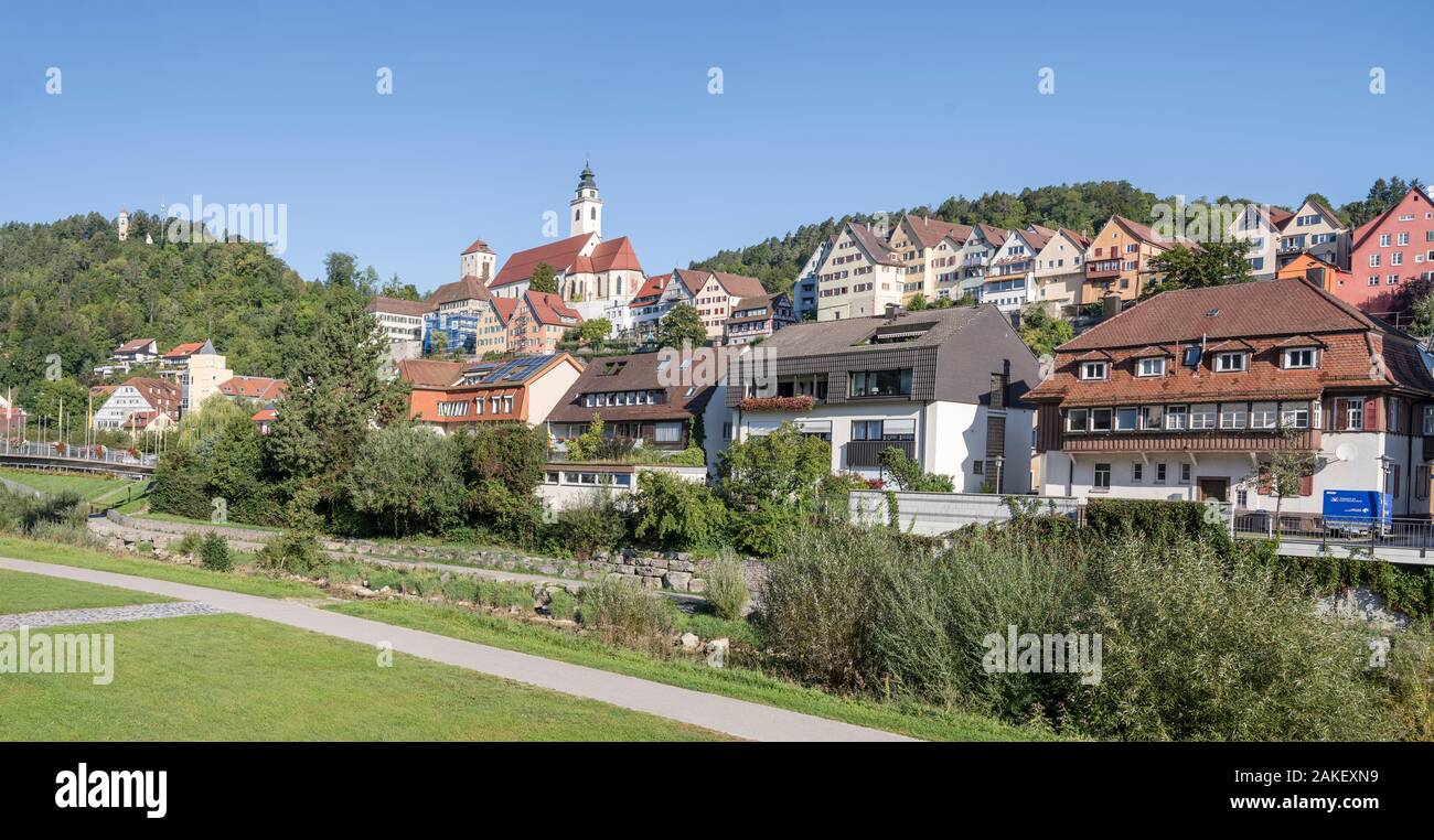HORB AM NECKAR, GERMANY - September 15 2019: cityscape of touristic historical little town with green park and Baroque church, shot in summer bright l Stock Photo