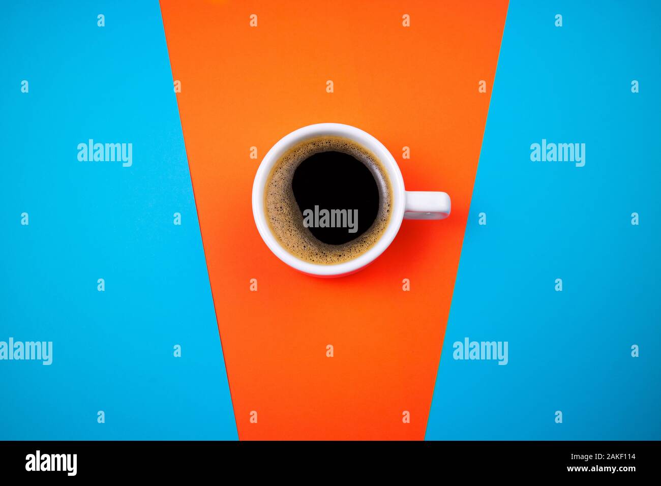 Coffee cup espresso on trend colorful background. Coffee cup closeup. Morning, breakfast, energy, coffee break concept. Trendy colors of 2020 blue and Stock Photo
