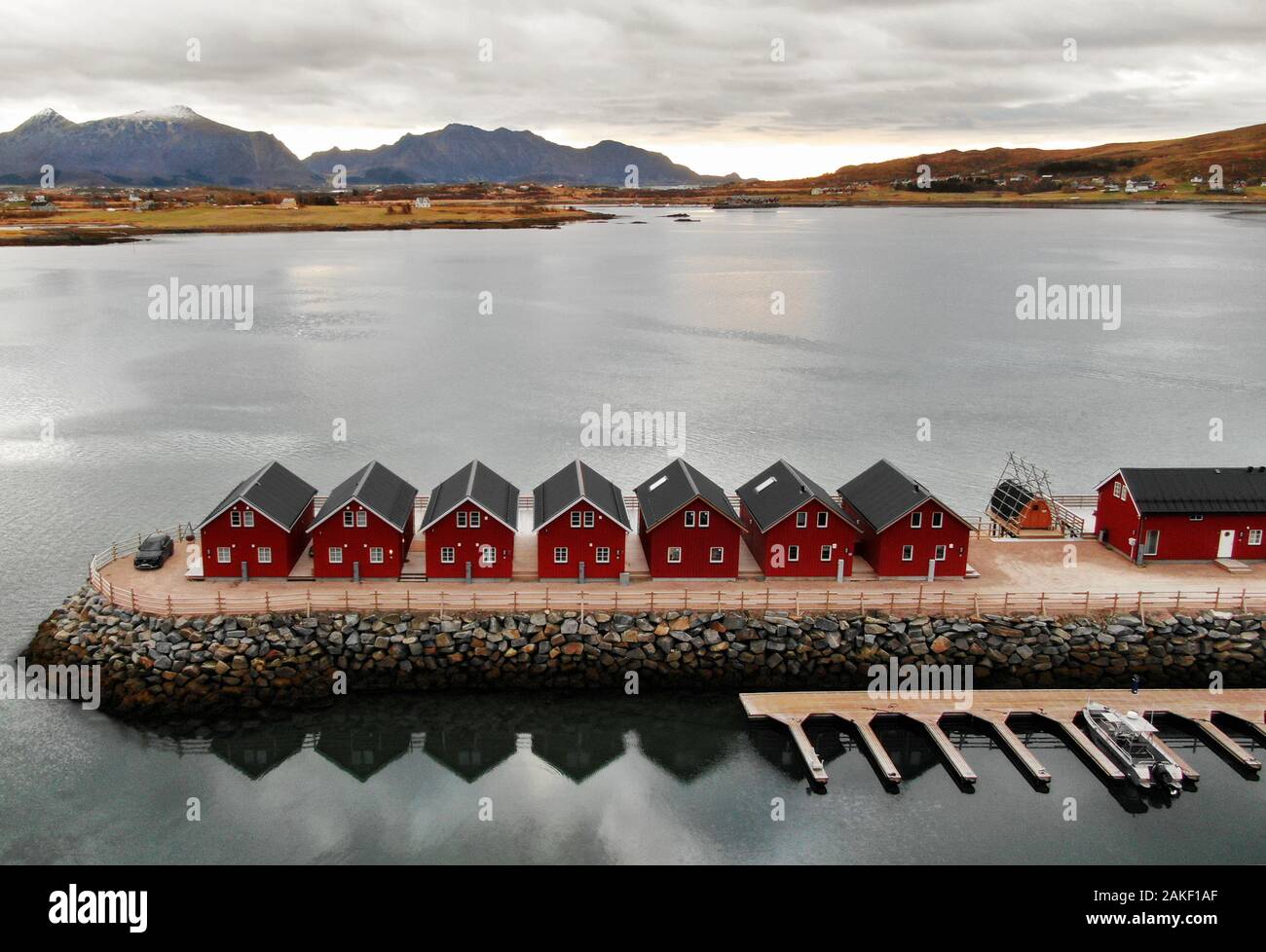 Landscape of Lofoten Islands with rorbuer,  houses used by fishermen. Use for fishing has diminished and housing is now used to rent out to tourists Stock Photo