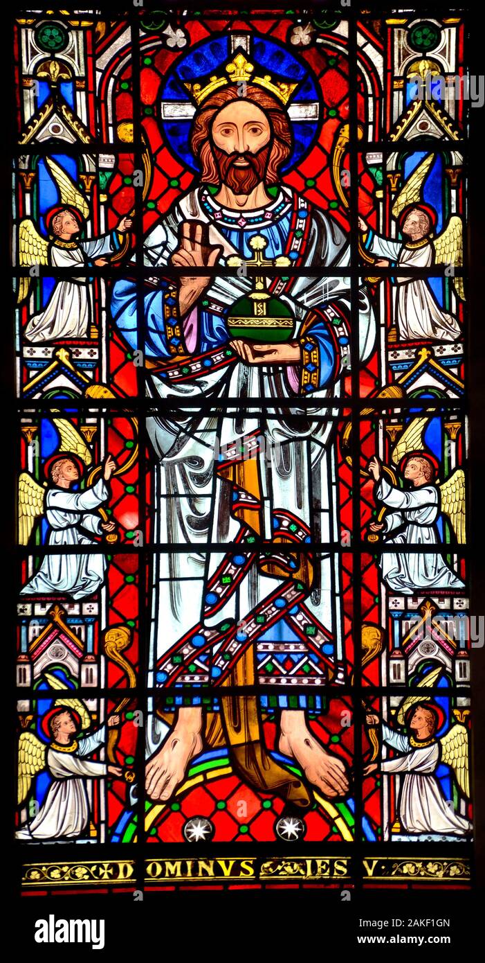 Rochester, Kent, UK. Rochester Cathedral (1080AD: Britain's second oldest - founded AD 604) Stained glass window: Dominus Jesu - Jesus Christ and ange Stock Photo