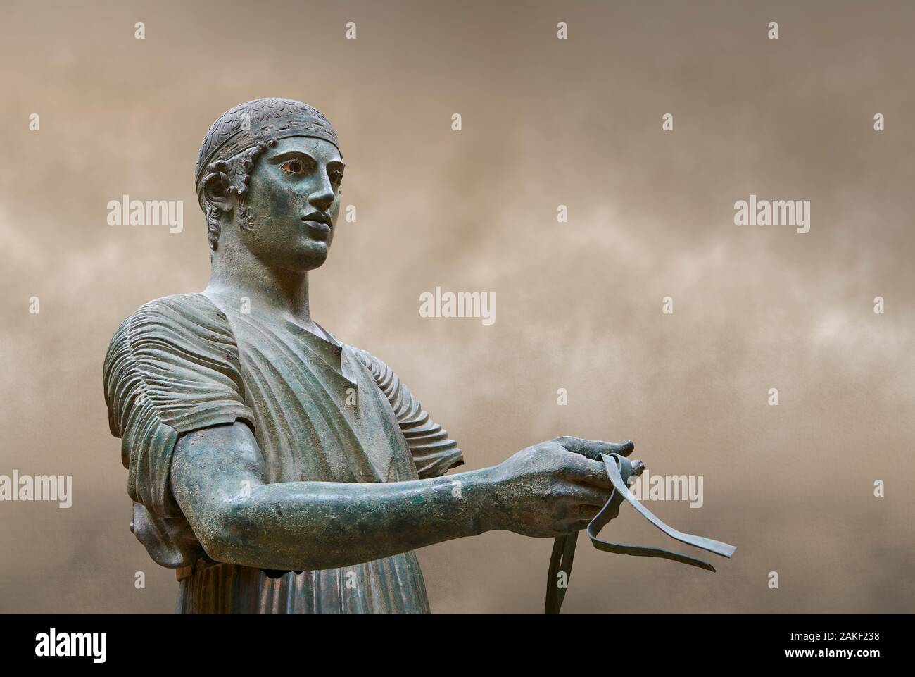 Severe Style Ancient Greek bronze sculpture of a charioteer, 480460 BC