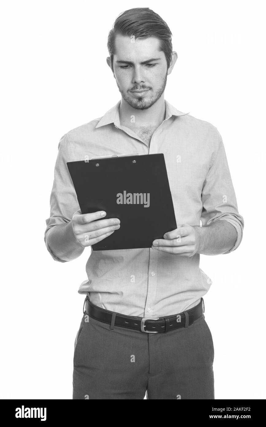 Portrait of young handsome bearded man in black and white Stock Photo ...