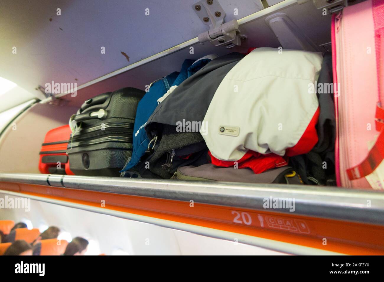 Overhead passenger locker / lockers / compartment / compartments for stowing passengers bags cabin luggage on an Easyjet Airbus A320 or  A319 plane. (105) Stock Photo
