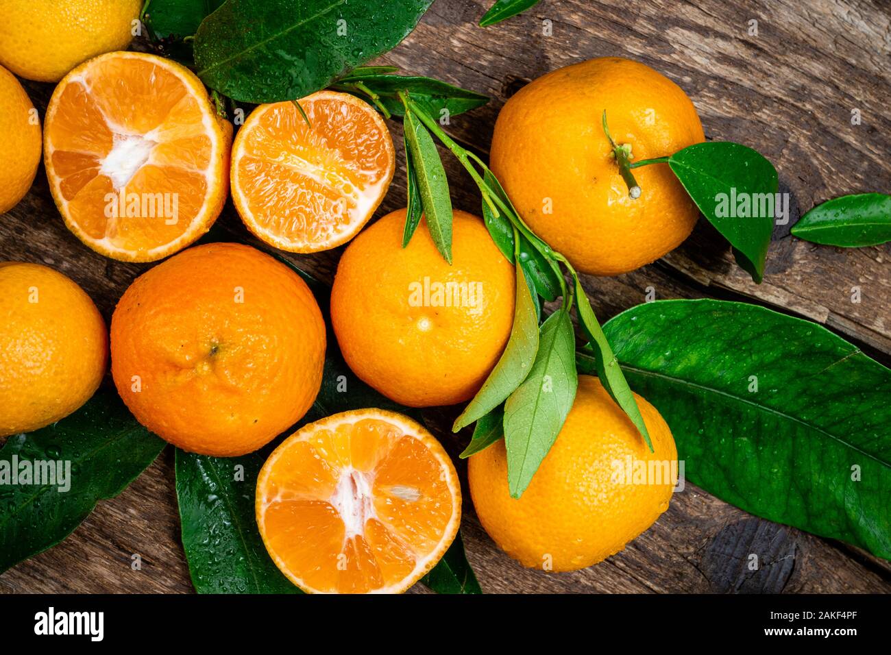 One-Time Deal Fresh ripe mandarin oranges (clementine, tangerine) with  green leaves on retail market display, close up, high angle view Stock  Photo - Alamy, mandarin oranges fresh 