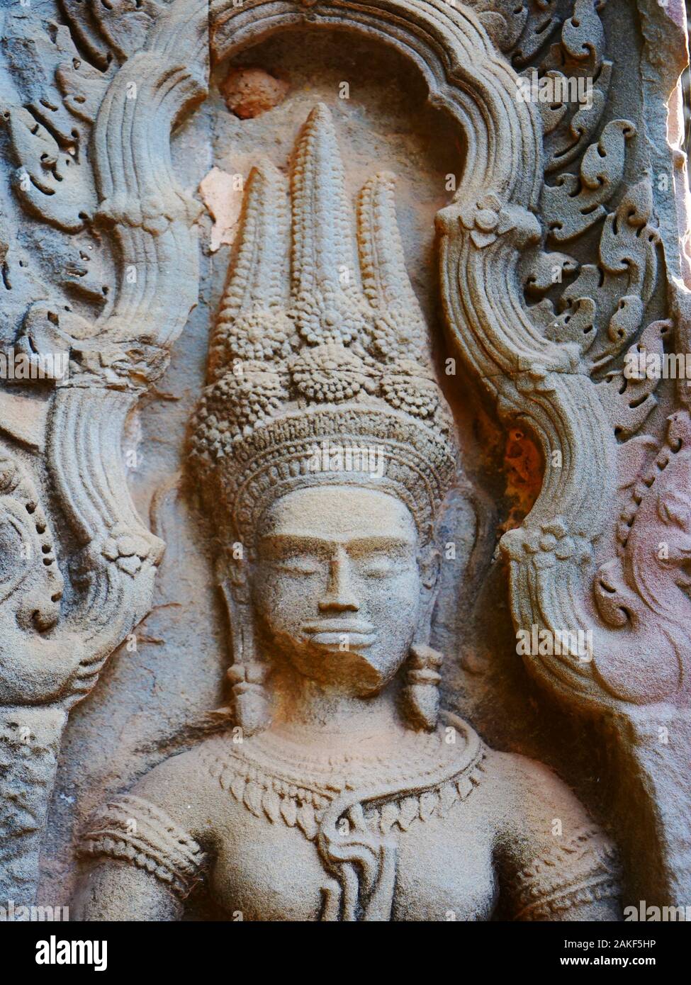 Stone rock carving art at Ta Prohm Temple in Angkor wat complex, Siem
