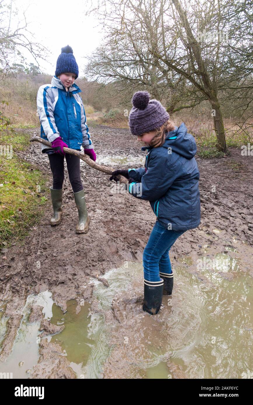 Young girl playing in muddy hi res stock photography and images Alamy