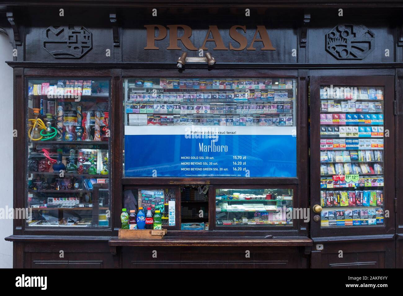 A small shop or street kiosk selling many varieties of cigarettes and tobacco in Krakow, Poland Stock Photo